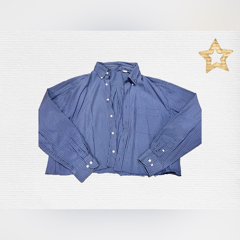 Cut off, Blue button up shirt. Great condition, used.